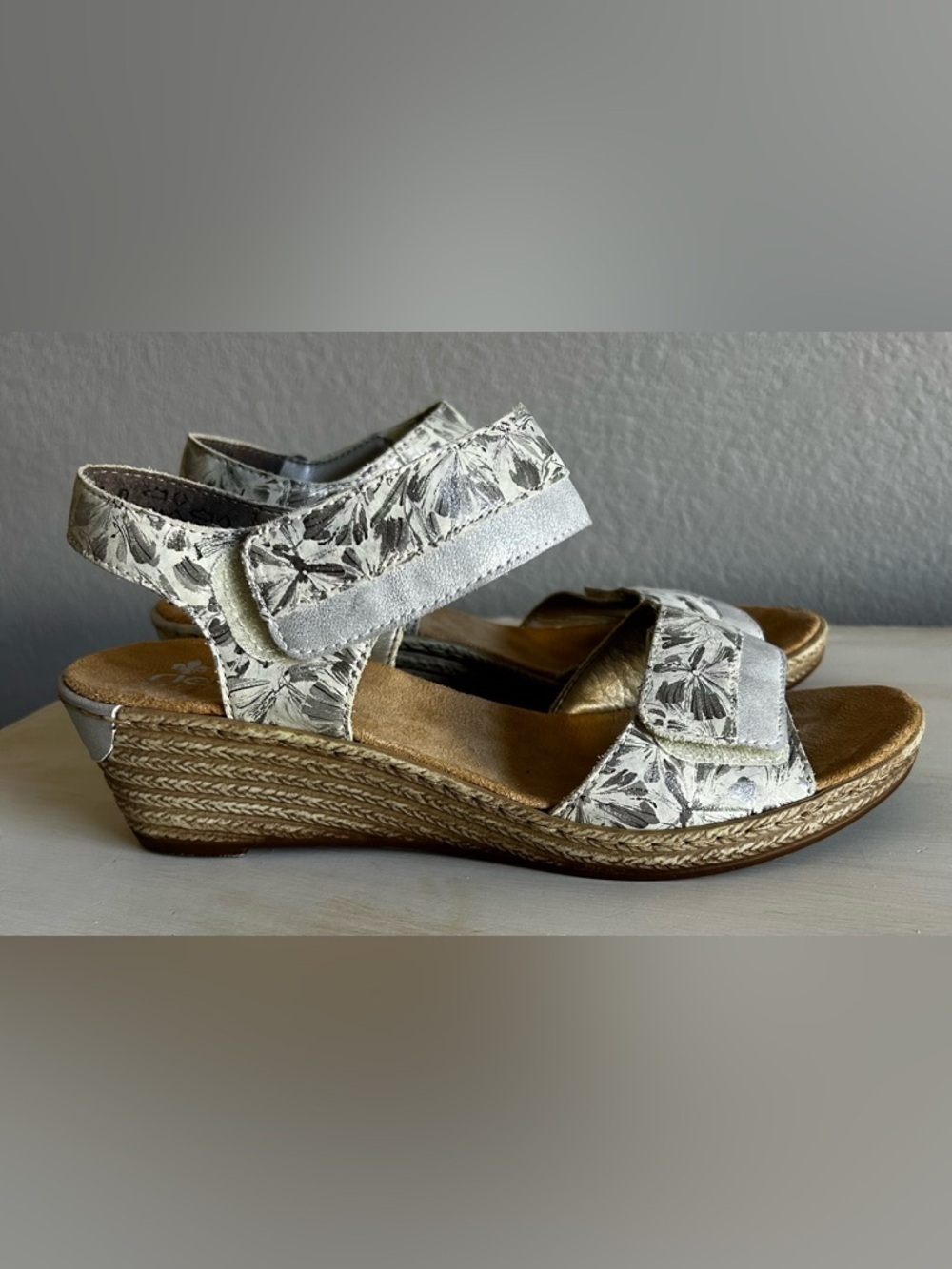 Rieker wedge sandals, white/black floral, silver accents, women’s size 40.